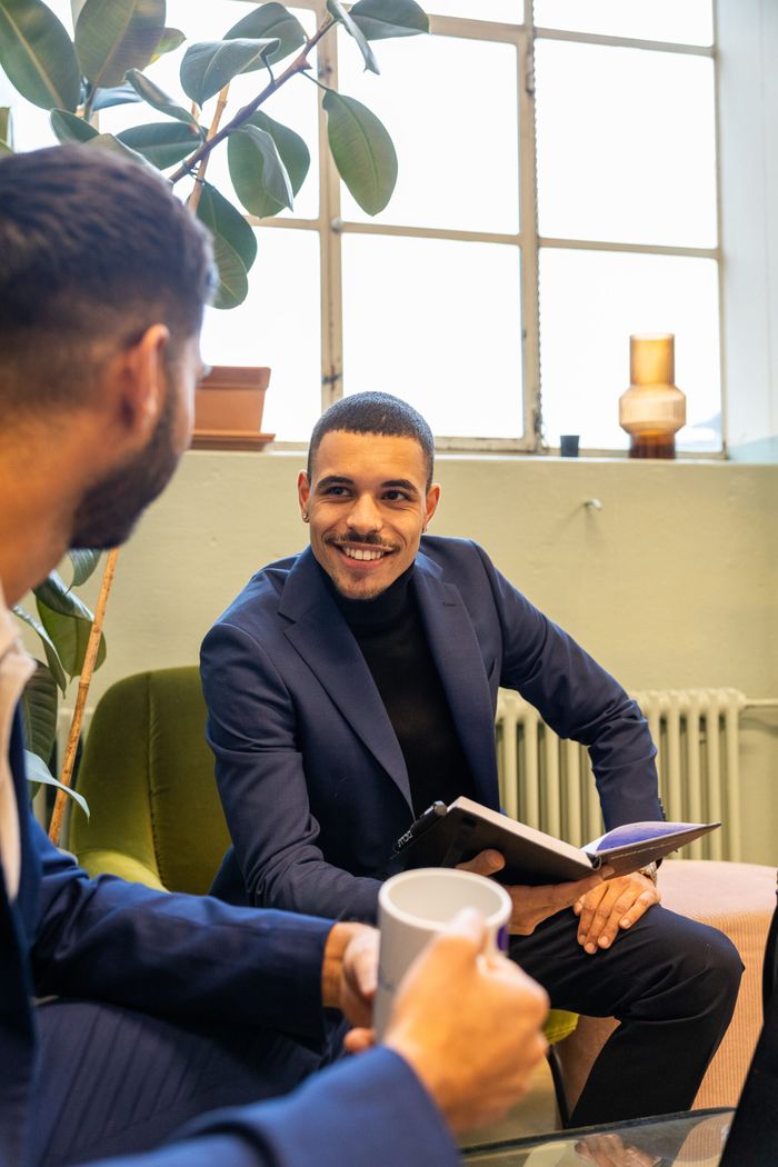 Two men in a calm conversation